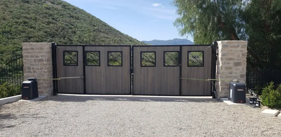 Custom dual swing driveway gate with automatic openers